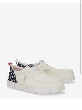 Hey Dude Cream Slip-On Loafers with Navy Star Heel and Red Pull Tab